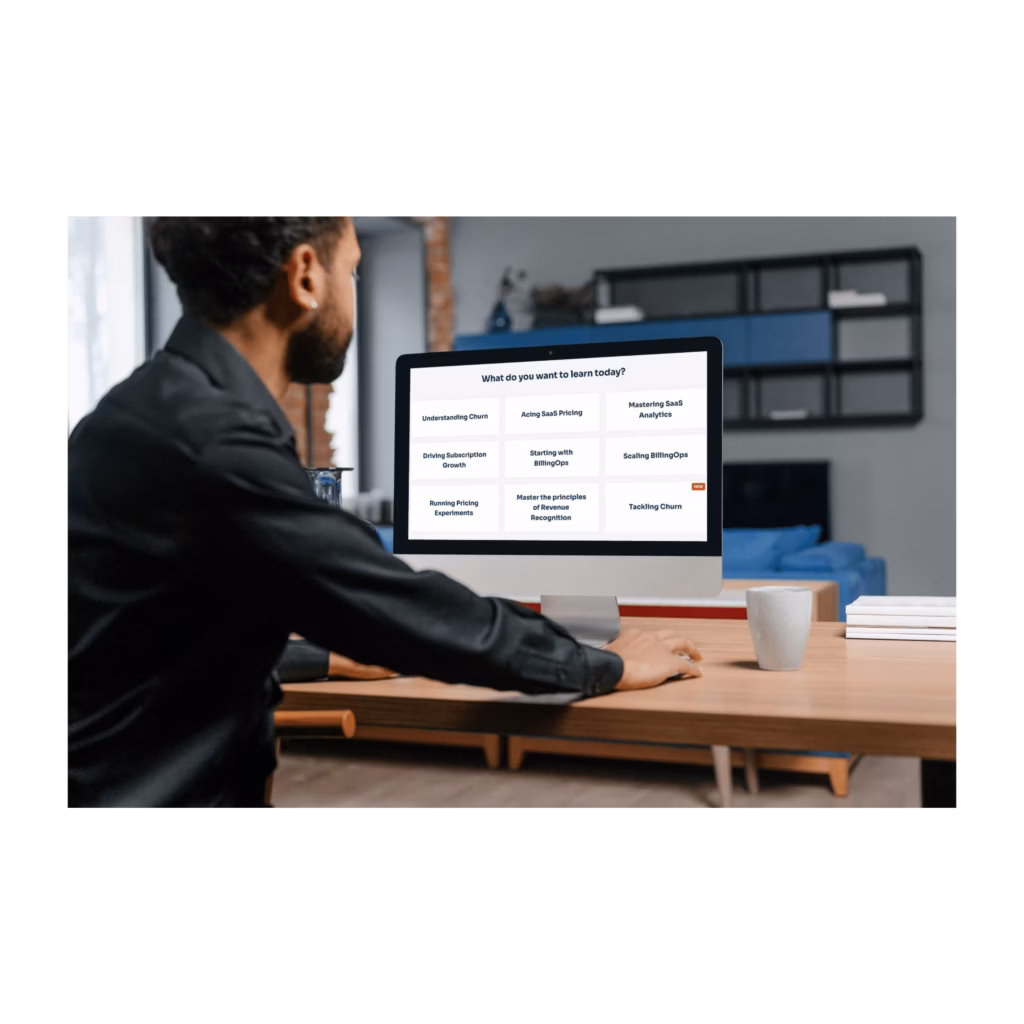man in front of a computer